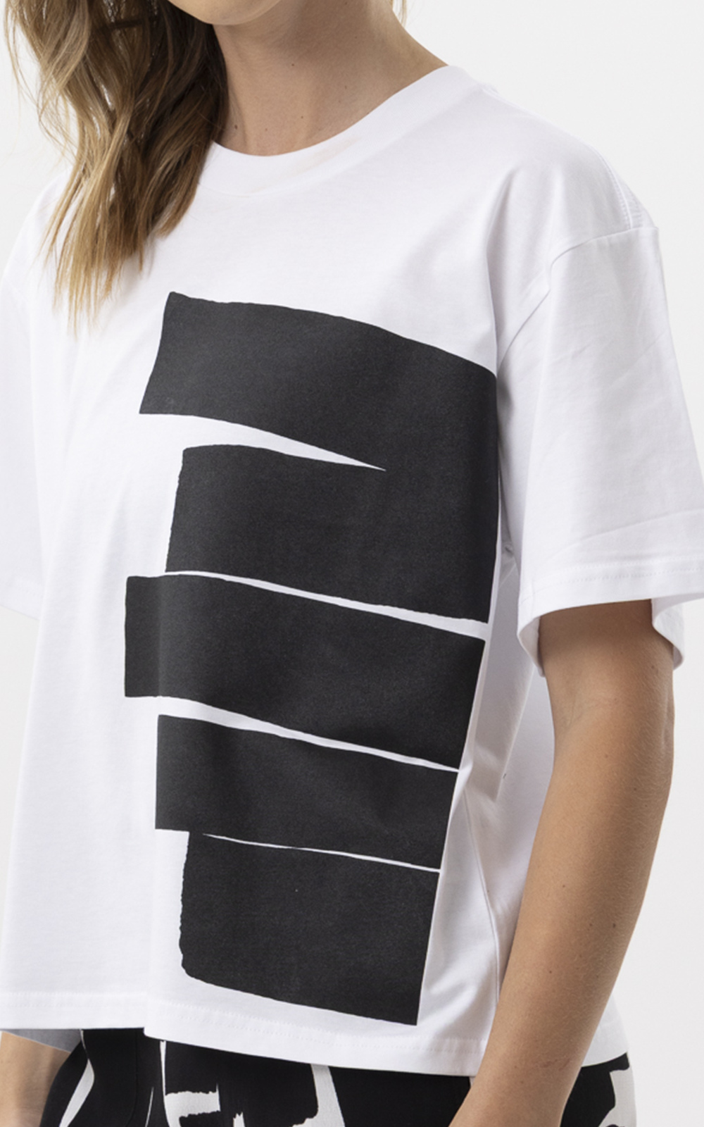 Abstract Tee product photo.