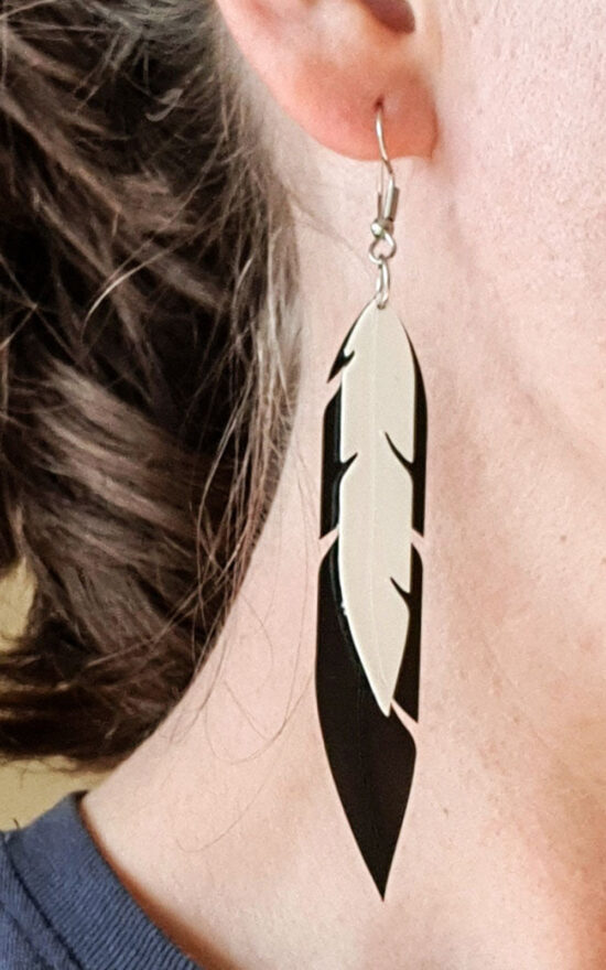 Pied Cormorant Feather Earrings product photo.